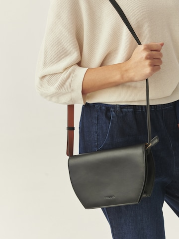 TATUUM - Mala de ombro 'Kael' em preto