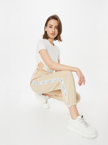 LEVI'S ® Ozke Hlače 'Graphic Laundry Sweatpant' | bež barva