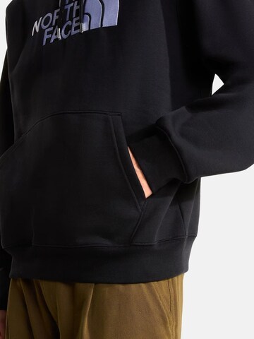 THE NORTH FACE Bluzka sportowa 'THE NORTH FACE M ESS DP REG HODDIE FELPA' w kolorze czarny