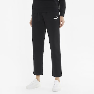 PUMA Regular Sports trousers in Black: front