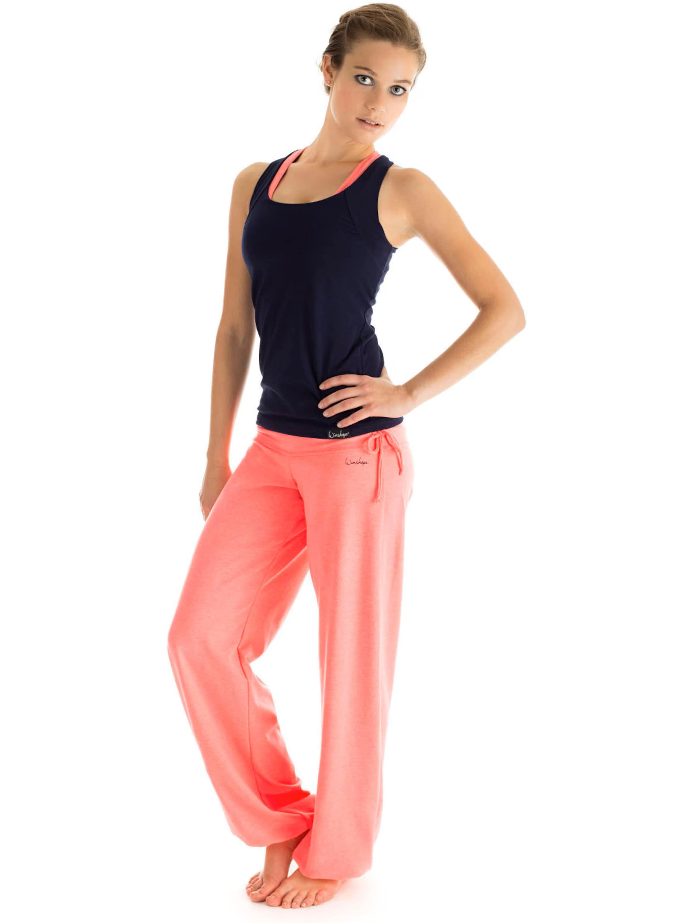 Winshape Дънки Tapered Leg Спортен панталон 'WH1' в оранжево