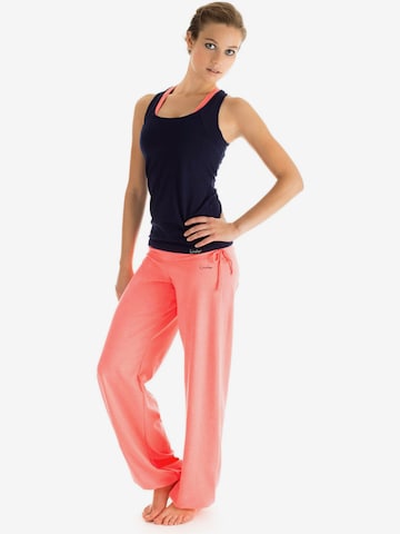 Tapered Pantaloni sportivi 'WH1' di Winshape in arancione