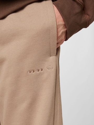 ADIDAS ORIGINALS Tapered Trousers 'Reveal Essentials' in Brown