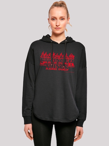 Sweat-shirt 'Stranger Things Flames Netflix TV Series' F4NT4STIC en noir : devant