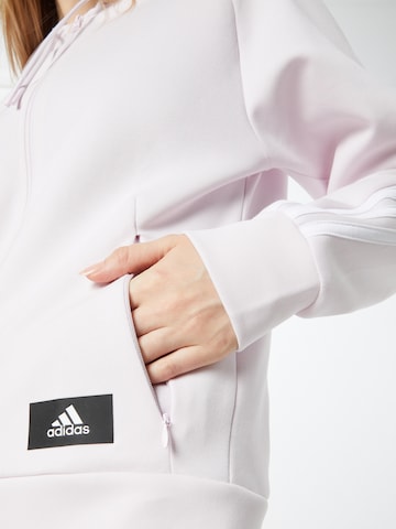 ADIDAS SPORTSWEAR - Casaco de treino em moletão em roxo