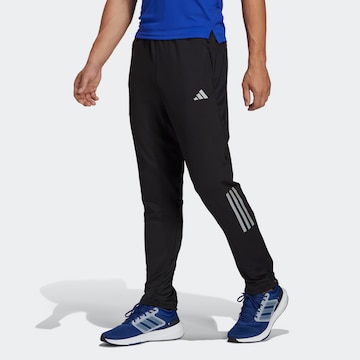 ADIDAS PERFORMANCE Slim fit Workout Pants 'Own The Run Astro ' in Black: front