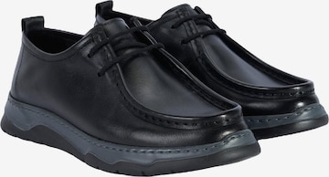 Desa Slipper in Schwarz: Vorderseite