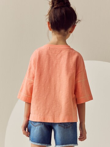 Next - Camiseta en naranja