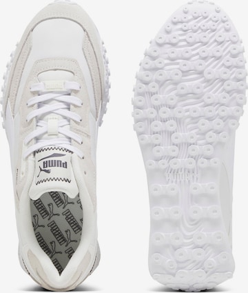 Baskets basses 'Blacktop Rider' PUMA en blanc