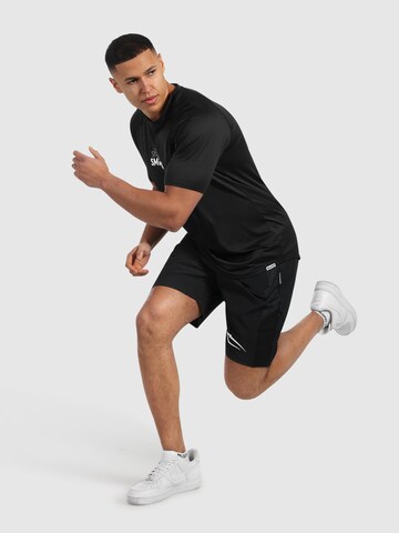 Regular Pantalon de sport Smilodox en noir