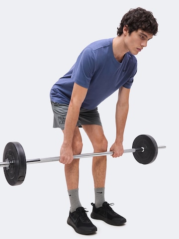 Regular Pantalon de sport 'Flex' NIKE en gris