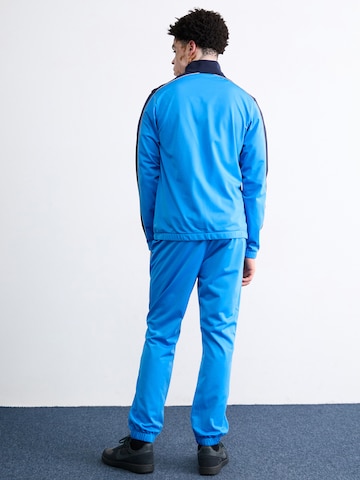 Nike Sportswear Обычный Костюм для бега 'CLUB' в Синий