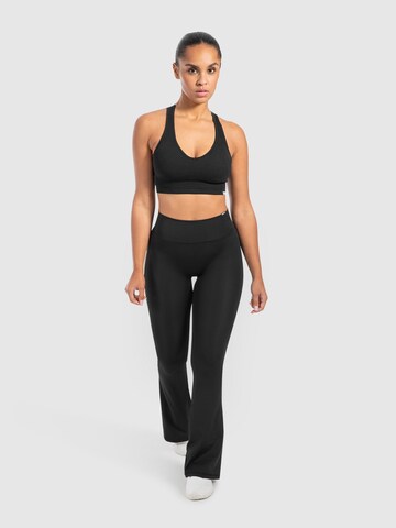 évasé Pantalon de sport ' Loreen ' Smilodox en noir