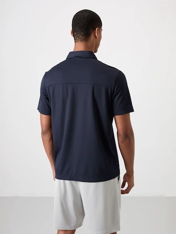 T-Shirt fonctionnel Tommy Life en bleu