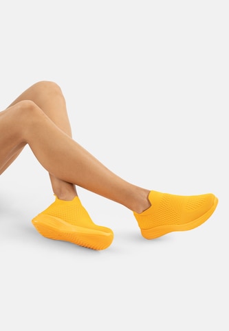 Slip on Elara en orange