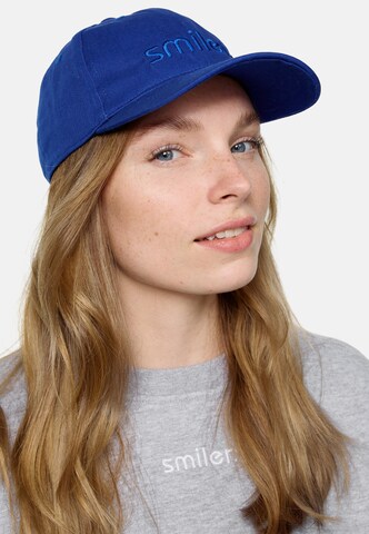 Casquette smiler. en bleu : devant