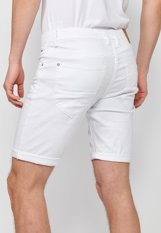 KOROSHI Slimfit Jeans i vit