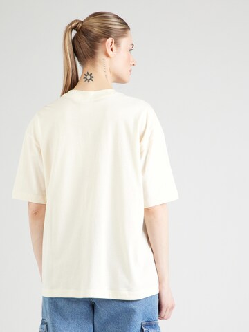 Maglietta di Champion Authentic Athletic Apparel in beige