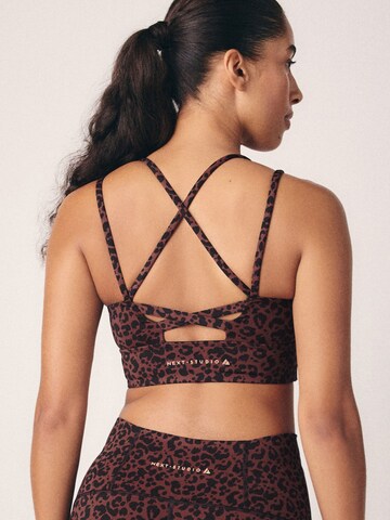 Bustier Soutien-gorge de sport 'mittelstarker Halt' Next en rouge