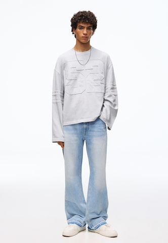 Flared Jeans di Bershka in blu