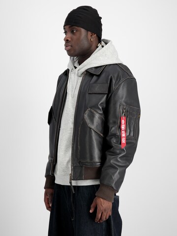 ALPHA INDUSTRIES Övergångsjacka 'CWU' i brun