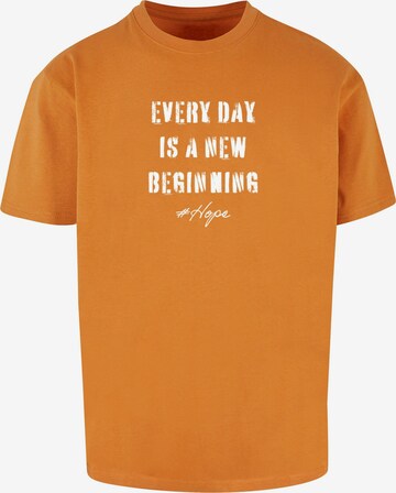 Merchcode Shirt 'Hope 2' in Oranje: voorkant