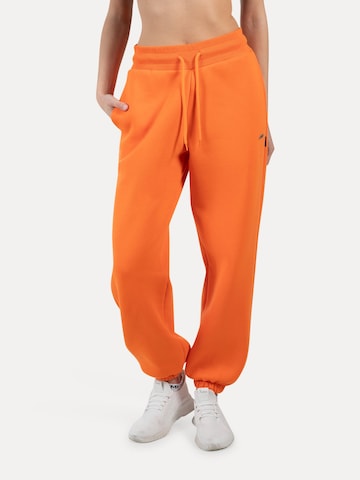 Effilé Pantalon Smilodox en orange : devant