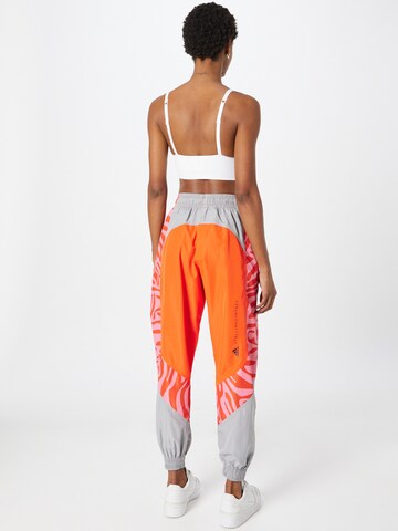 ADIDAS BY STELLA MCCARTNEY Tapered Workout Pants in Orange