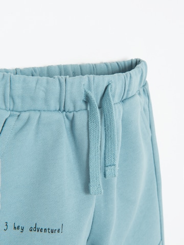 Effilé Pantalon Cool Club en bleu