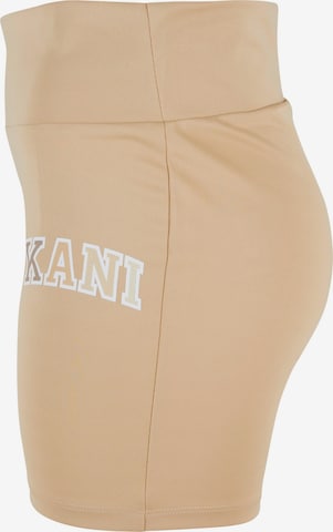 Skinny Pantalon de sport Karl Kani en beige