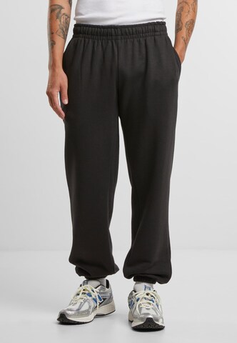 Urban Classics - Loosefit Pantalón 'Essential' en negro: frente