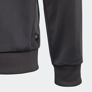 ADIDAS ORIGINALS Prehodna jakna 'Rekive' | črna barva