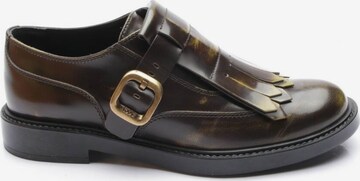 Tod's Flats & Loafers in 36 in Brown: front