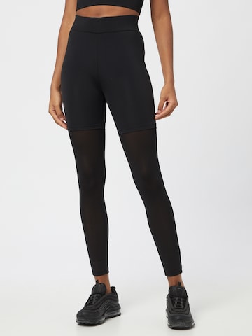 Urban Classics Skinny Leggings in Black: front