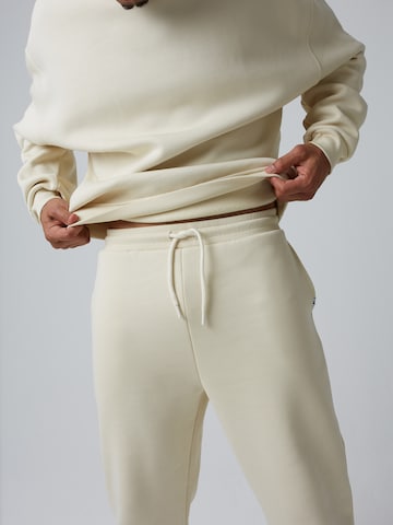 regular Pantaloni 'Keno' di ABOUT YOU x Benny Cristo in beige