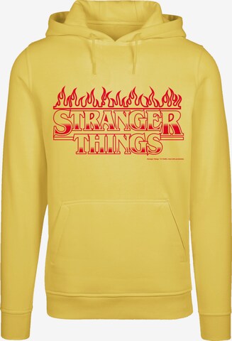 Sweat-shirt 'Stranger Things Flames Netflix TV Series' F4NT4STIC en jaune : devant