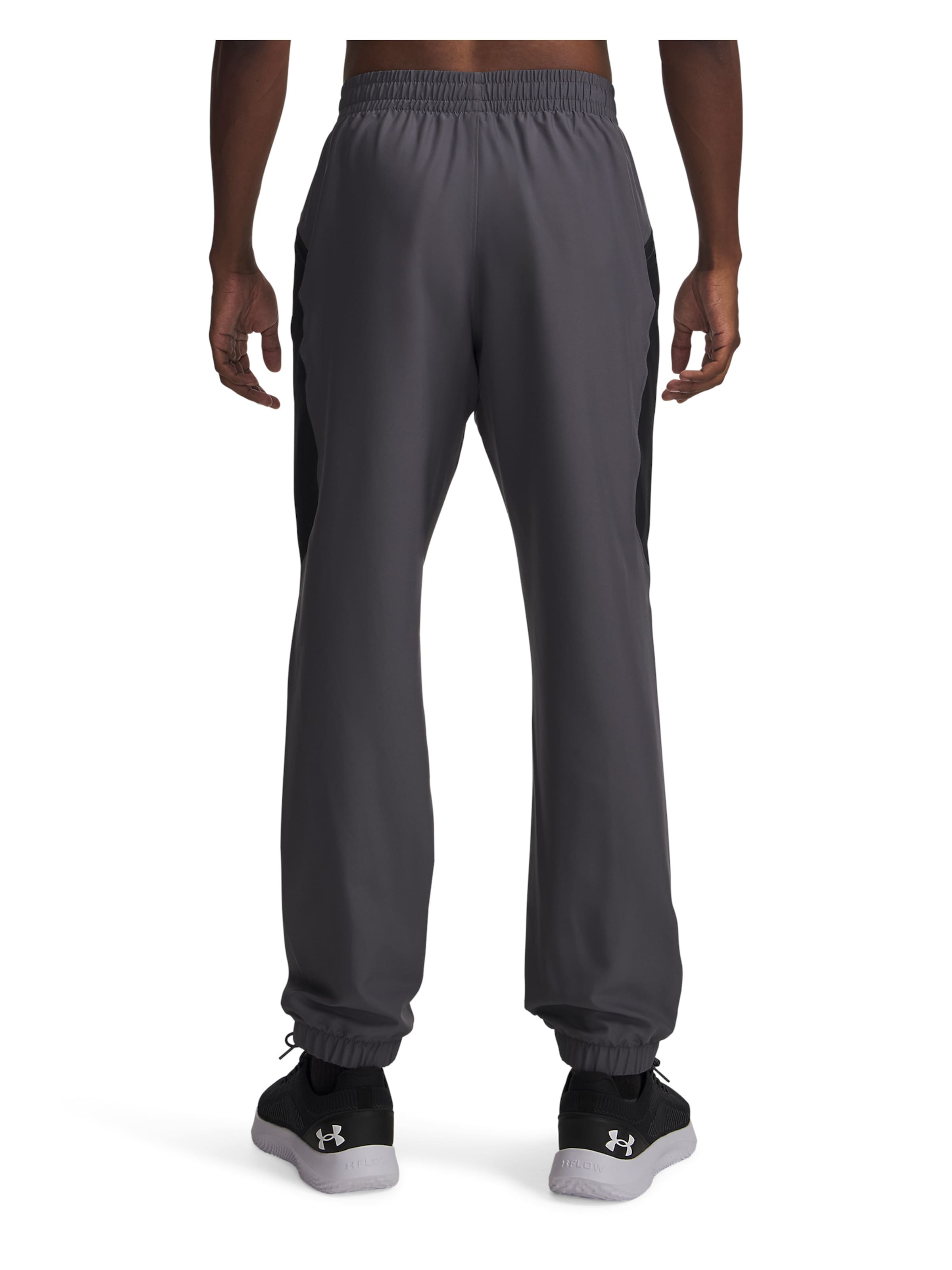 UNDER ARMOUR Tapered Sports trousers in Grey