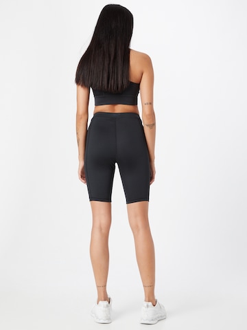 Skinny Pantalon de sport Reebok en noir