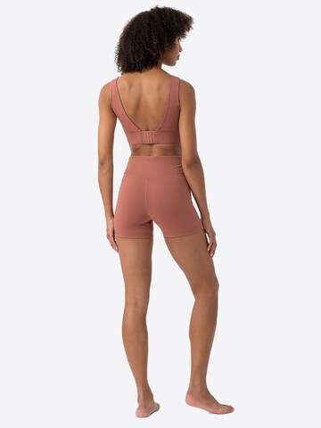 Skinny Pantaloni sportivi di 4F in rosa