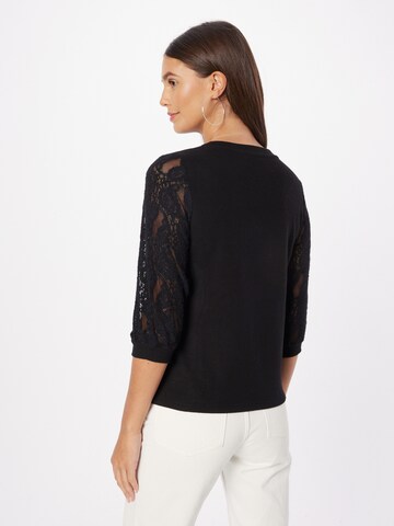 ABOUT YOU Shirt 'Emmy' in Schwarz