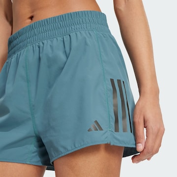 ADIDAS PERFORMANCE Regular Sportshorts 'Own The Run' in Grün
