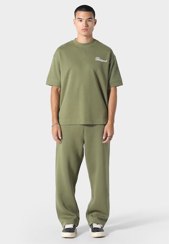 Irasuto Studios Tričko 'Koi' – zelená