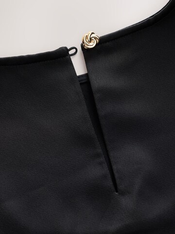 Next Pluus, värv must