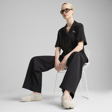 PUMA Blouse 'Wardrobe Ess' in Zwart