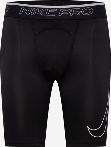 Skinny Pantalon de sport NIKE en noir : devant