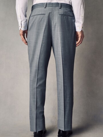 Slimfit Pantaloni con piega frontale di Next in grigio