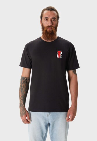 Oldskull T-Shirt 'ASIAN METROPOLIS SKULL GRAPHIC' in Schwarz: Vorderseite