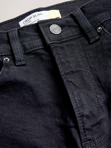 juoda Next Standartinis Džinsai