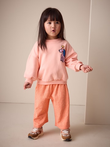 Next - Conjuntos em laranja: frente