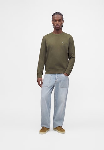Calvin Klein JeansSweater majica - zelena boja